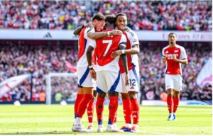 ARSENAL PLAYERS CELEBRATE THEIR SECOND GOAL AGAINST WOLVES ON SATURDAY (IMAGE CREDIT: GETTY IMAGES)